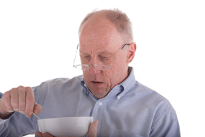 older man eating cereal